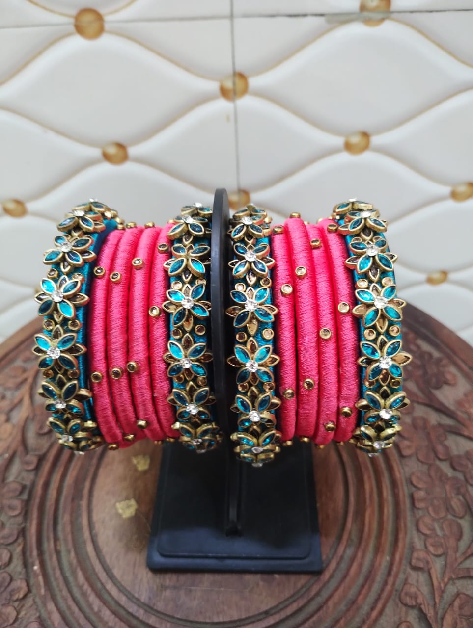 Lite pink thread with embossed blue stone bangles